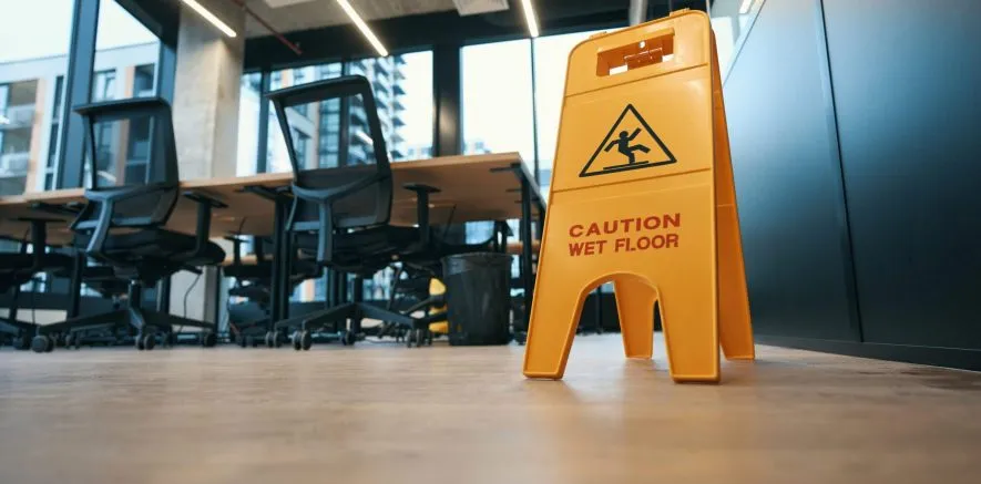 Wet Floor Warning Sign In A Dallas Store Where Slip Hazards Cause Injuries